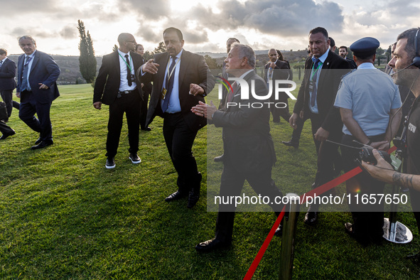 King of Jordan Abdullah II bin Al Hussein leaves the family photo area in Paphos, Cyprus, on October 11, 2024. The 11th Summit of the Southe...