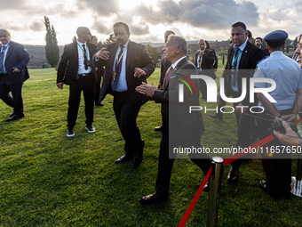 King of Jordan Abdullah II bin Al Hussein leaves the family photo area in Paphos, Cyprus, on October 11, 2024. The 11th Summit of the Southe...