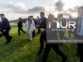 King of Jordan Abdullah II bin Al Hussein leaves the family photo area in Paphos, Cyprus, on October 11, 2024. The 11th Summit of the Southe...