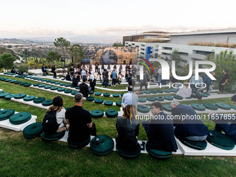 Media members wait for the press conference to start in Paphos, Cyprus, on October 11, 2024. The 11th Summit of the Southern EU Countries (M...