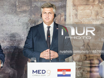 Prime Minister of Croatia Andrej Plenkovic is seen during the press conference in Paphos, Cyprus, on October 11, 2024. The 11th Summit of th...