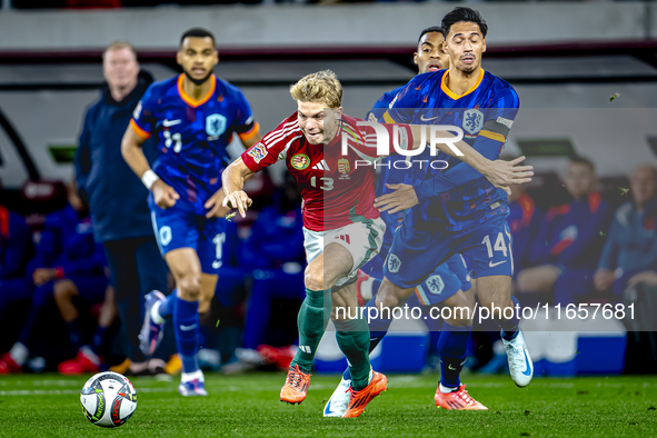 Hungary midfielder Andras Schafer and Netherlands midfielder Tijani Reijnders play during the match between Hungary and the Netherlands at t...