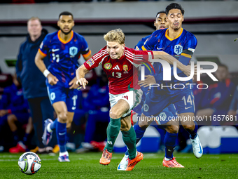 Hungary midfielder Andras Schafer and Netherlands midfielder Tijani Reijnders play during the match between Hungary and the Netherlands at t...