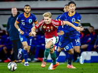 Hungary midfielder Andras Schafer and Netherlands midfielder Tijani Reijnders play during the match between Hungary and the Netherlands at t...