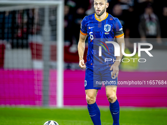 Netherlands defender Stefan de Vrij plays during the match between Hungary and the Netherlands at the Puskas Arena for the UEFA Nations Leag...