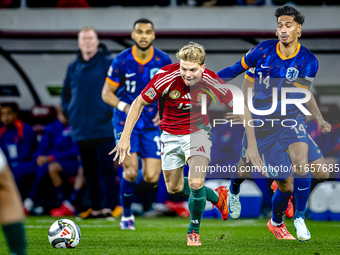 Hungary midfielder Andras Schafer and Netherlands midfielder Tijani Reijnders play during the match between Hungary and the Netherlands at t...