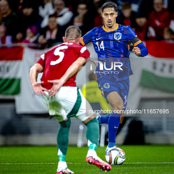 Netherlands midfielder Tijani Reijnders plays during the match between Hungary and the Netherlands at the Puskas Arena for the UEFA Nations...