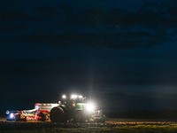 FONTENAY-LE-PESNEL, FRANCE - OCTOBER 11: 
A tractor John Deere 6250R pulls the AEROSEM POTTINGER pneumatic seed drill through a field near F...