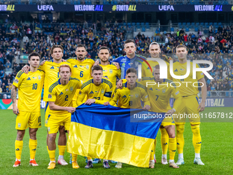 Ukrainian team is posing during the  UEFA Nations League 2024 League B Group B1 match between Ukraine and Georgia , at the Poznan Arena in P...