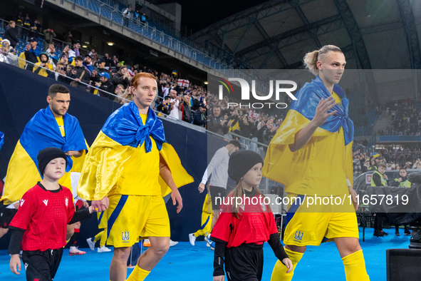 Yukhym Konoplia, Maksym Talovierov during the  UEFA Nations League 2024 League B Group B1 match between Ukraine and Georgia , at the Poznan...