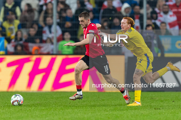 Giorgi Chakvetadze, Yukhym Konoplia are playing  during the  UEFA Nations League 2024 League B Group B1 match between Ukraine and Georgia ,...