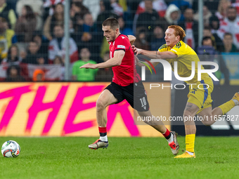 Giorgi Chakvetadze, Yukhym Konoplia are playing  during the  UEFA Nations League 2024 League B Group B1 match between Ukraine and Georgia ,...