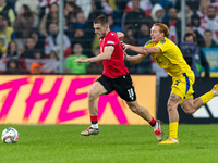 Giorgi Chakvetadze, Yukhym Konoplia are playing  during the  UEFA Nations League 2024 League B Group B1 match between Ukraine and Georgia ,...