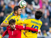 Khvicha Kvaratskhelia, Ivan Kaliuzhnyi and  Mykola Shaparenko are playing  during the  UEFA Nations League 2024 League B Group B1 match betw...