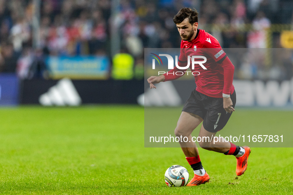 Khvicha Kvaratskhelia is playing  during the  UEFA Nations League 2024 League B Group B1 match between Ukraine and Georgia , at the Poznan A...