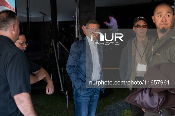 Michael Flynn, Justin Moon, Sean Moon at the annual Rod of Iron Festival in Greeley, Pennsylvania, on October 11, 2024, where a showing of t...