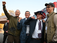 Michael Flynn, Justin Moon, Sean Moon at the annual Rod of Iron Festival in Greeley, Pennsylvania, on October 11, 2024, where a showing of t...