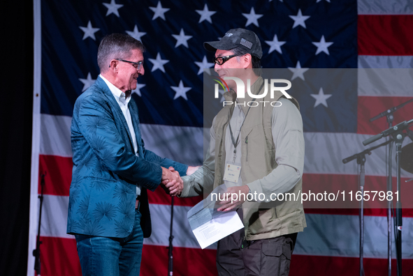 Michael Flynn, Justin Moon at the Rod of Iron Festival in Greeley, Pennsylvania, on October 11, 2024, where a showing of the documentary ''F...