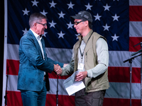 Michael Flynn, Justin Moon at the Rod of Iron Festival in Greeley, Pennsylvania, on October 11, 2024, where a showing of the documentary ''F...