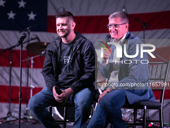 Michael Flynn, Michael Flynn Jr. at the annual Rod of Iron Festival in Greeley, Pennsylvania, on October 11, 2024, where a showing of the do...