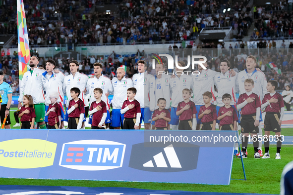 Players of Italy sing national anthem during the UEFA Nations League 2024/25 League A Group A2 match between Italy and Belgium at Stadio Oli...