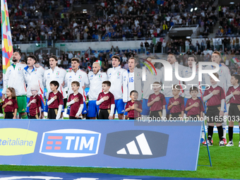 Players of Italy sing national anthem during the UEFA Nations League 2024/25 League A Group A2 match between Italy and Belgium at Stadio Oli...