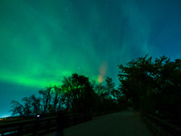 The Aurora Borealis, or Northern Lights, is visible over Chisago City, Minnesota, due to a major geomagnetic storm and heightened solar acti...