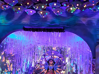 Devotees visit the puja pandal where the idol of Hindu Goddess 'Durga' is worshiped during the Durga Puja festival celebrations in Siliguri,...