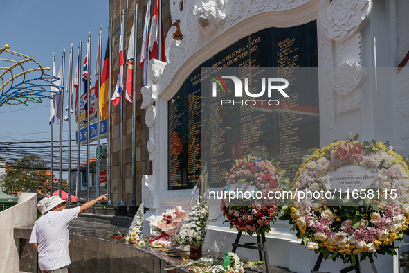 Tourists visit the Bali Bombing Memorial during the 22nd commemoration of the 2002 Bali bombing tragedy in Kuta, Bali, Indonesia, on October...