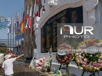 Tourists visit the Bali Bombing Memorial during the 22nd commemoration of the 2002 Bali bombing tragedy in Kuta, Bali, Indonesia, on October...