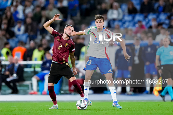 Zeno Debast of Belgium and Niccolo' Pisilli of Italy compete for the ball during the UEFA Nations League 2024/25 League A Group A2 match bet...