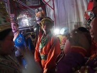 Chinese opera performers are backstage during the Vegetarian Festival at a Chinese shrine in Bangkok, Thailand, on October 7, 2024. The Vege...