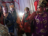 Chinese opera performers are backstage during the Vegetarian Festival at a Chinese shrine in Bangkok, Thailand, on October 7, 2024. The Vege...