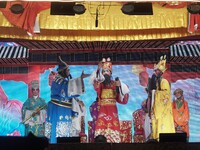 Chinese opera performers are on stage during the Vegetarian Festival at a Chinese shrine in Bangkok, Thailand, on October 7, 2024. The Veget...