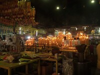 People gather at a Chinese shrine during the Vegetarian Festival in Chinatown in Bangkok, Thailand, on October 7, 2024. The Vegetarian Festi...