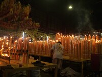 People gather at a Chinese shrine during the Vegetarian Festival in Chinatown in Bangkok, Thailand, on October 7, 2024. The Vegetarian Festi...