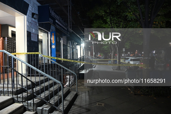 An unidentified man is shot and is in critical condition in the Harlem section of Manhattan, New York, United States, on October 12, 2024. A...