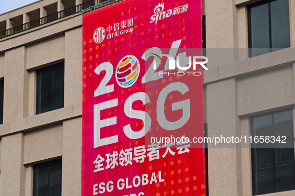 A poster for the 2024 ESG Global Leadership Conference, held from October 16 to 18, 2024, stands out on the wall of the Old City Building in...