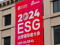 A poster for the 2024 ESG Global Leadership Conference, held from October 16 to 18, 2024, stands out on the wall of the Old City Building in...