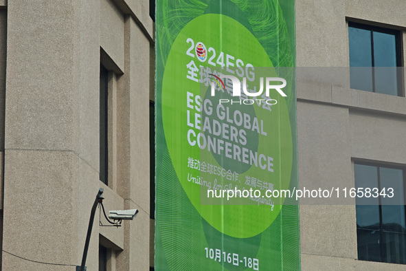 A poster for the 2024 ESG Global Leadership Conference, held from October 16 to 18, 2024, stands out on the wall of the Old City Building in...