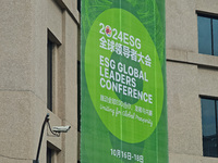 A poster for the 2024 ESG Global Leadership Conference, held from October 16 to 18, 2024, stands out on the wall of the Old City Building in...