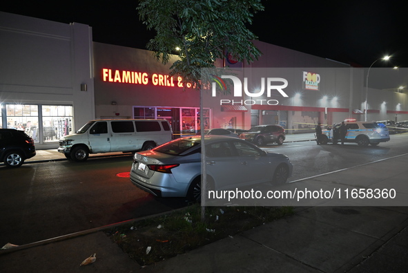 An unidentified man in his 20s is shot and killed in the Flatbush section of Brooklyn, New York, United States, on October 12, 2024. On Sund...