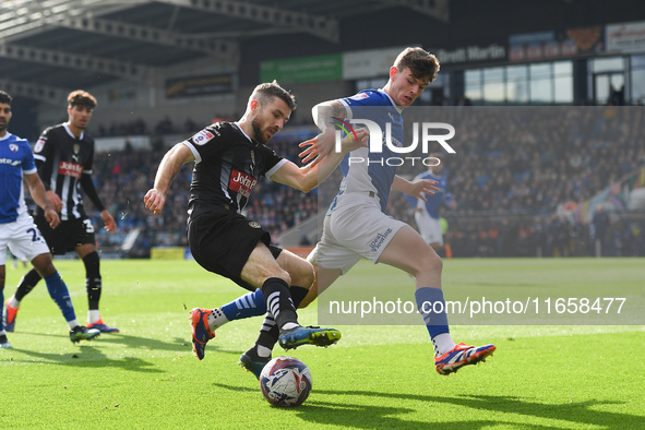 Dan Crowley of Notts County battles with Jenson Metcalfe of Chesterfield during the Sky Bet League 2 match between Chesterfield and Notts Co...