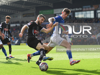 Dan Crowley of Notts County battles with Jenson Metcalfe of Chesterfield during the Sky Bet League 2 match between Chesterfield and Notts Co...