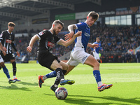 Dan Crowley of Notts County battles with Jenson Metcalfe of Chesterfield during the Sky Bet League 2 match between Chesterfield and Notts Co...