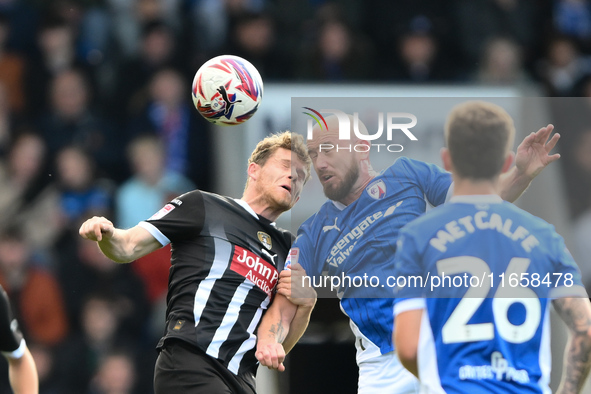 Matt Palmer of Notts County battles with Paddy Madden of Chesterfield during the Sky Bet League 2 match between Chesterfield and Notts Count...