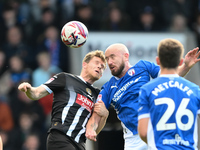 Matt Palmer of Notts County battles with Paddy Madden of Chesterfield during the Sky Bet League 2 match between Chesterfield and Notts Count...