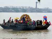 Maharaja Naba Krishna starts Durga Puja in 1757 at Sovabazar Royal Palace. An idol of Goddess Durga is seen being uploaded onto two boat mid...