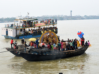 Maharaja Naba Krishna starts Durga Puja in 1757 at Sovabazar Royal Palace. An idol of Goddess Durga is seen being uploaded onto two boat mid...