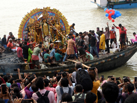 Maharaja Naba Krishna starts Durga Puja in 1757 at Sovabazar Royal Palace. An idol of Goddess Durga is seen being uploaded onto two boat mid...